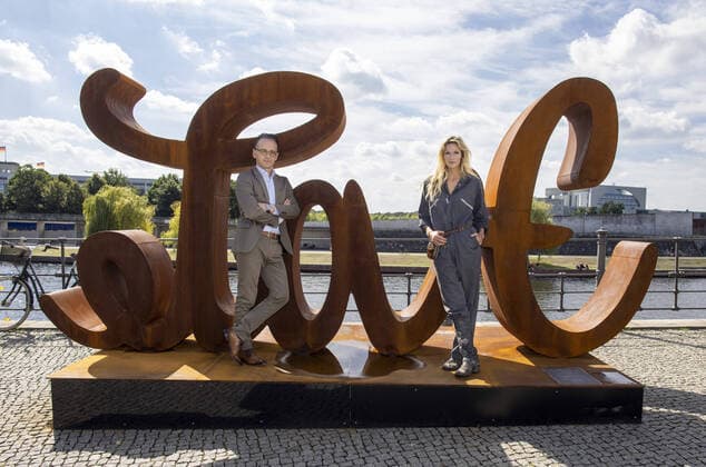 Heiko Maas, Federal Minister for Foreign Affairs, with performance artist Mia Florentine Weiss in front of her artwork Love Hate at the Kapelle Ufer in Berlin The lettering reads as Love on one side and RâˆöÂºckseite as Hate on the other The ambigram has been deliberately chosen to indicate the ambivalence of love and hate in the modern world 03 09 202 Copyright: xThomasxImo photothek.netx