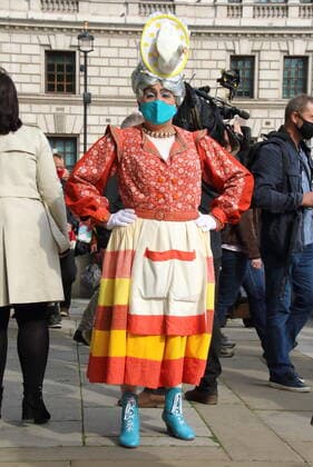 September 30, 2020, London, United Kingdom: Pantomime Dame wearing a face mask during the march..Pantomime Dames and various creatives and freelancers march to Parliament in Westminster in call for action to save theaters in London. Most West End Theaters will be closed till 2021 and no traditional Pantomime productions will be held in 2020 as a result of the long term lock down brought about by the COVID-19 pandemic. London United Kingdom - ZUMAs197 20200930_zaa_s197_210 Copyright: xKeithxMayhewx