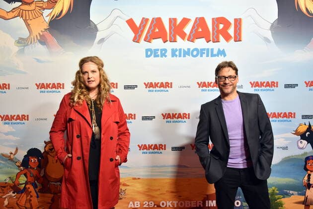 The actors Diana Amft and Patrick Bach pose at the Cologne premiere of Yakari The Motion Picture