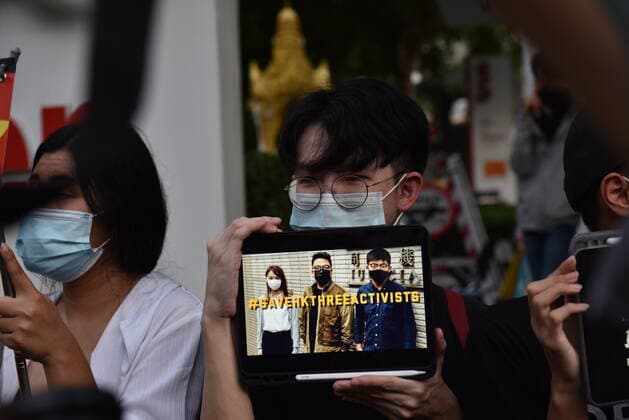 Thailand: Fight for democracy in Hong Kong Men and women gather on the opposite side of Embassy of The People s Republic of China in the Kingdom of Thailand, to speak alongside the fight for democracy in Hong Kong after Joshua Wong, Ivan Lam, and Agnes Chow, 3 Pro- democracy activists in Hong Kong who was detained by the authorities the previous day. Bangkok Thailand Copyright: TeeraxNoisakran