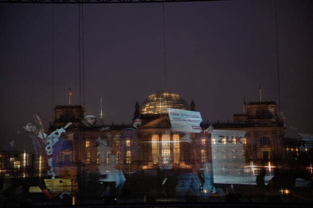 Hologram demo in front of the Reichstag Europe,Germany, Berlin, 04 02 2021 Ahead of the conference of agriculture ministers of the German states, which will meet on Friday, environmental groups and the Arbeitsgemeinschaft bäuerliche Landwirtschaft (Working Group for Farming) are protesting with a projection in front of the Reichstag