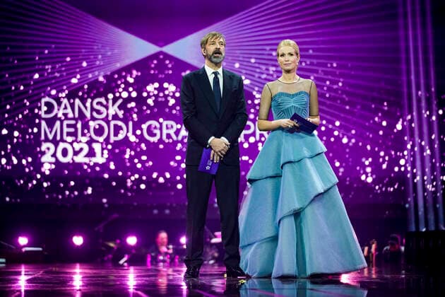 Hosts Tina Müller and Martin Brygmann on stage during the dress rehearsal for the Danish Melody Grand Prix 2021 in DR Byens Studie 5 in Copenhagen on 6 March 2021 DMGP is held for the first time since 1999 in a DR studio due to the corona COVID restrictions Pool cover provided by Ritzau Scanpix The material may be used free of charge for editorial coverage of DMGP  Copyright: MartinxSylvestx cop300 spdk20210306-173050-L