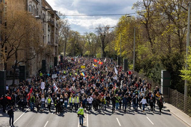 Demonstration of Querdenken 711 in Stuttgart 03 04 2021 Under the motto The year of freedom Basic rights are not negotiable supporters of the Querdenken movement demonstrate in Stuttgart Counter-demonstrators try to block the demonstrations on bicycles and on foot