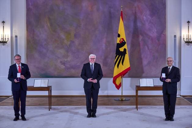 President Frank Walter Steinmeier centre on the occasion of the award of the Order of Merit of