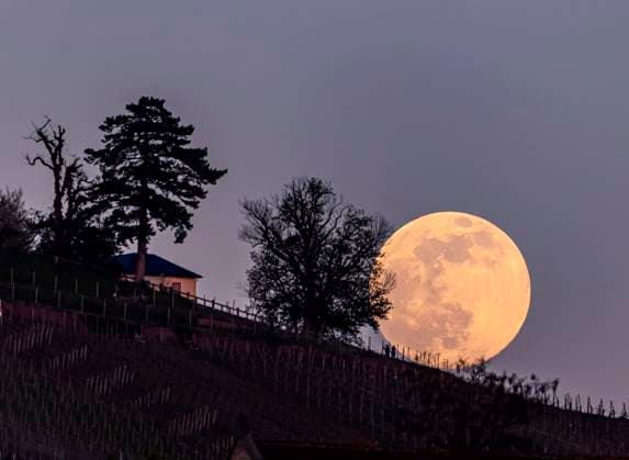 Rising Full Moon over Stuttgart Catholic St Johannes Church Untertürkheim 26 04 2021 Europe, Germany, Baden Wuerttemberg, Stuttgart