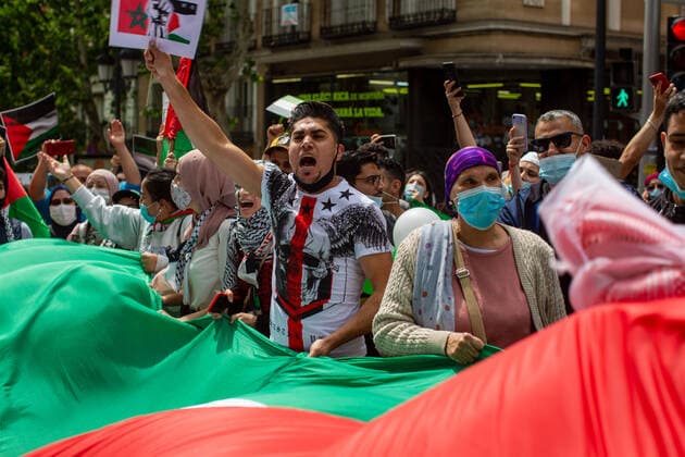 May 15, 2021, Madrid, Spain: Protesters chant slogans during a demonstration against the Israel attacks on the Palestinian people in Gaza. Madrid Spain - ZUMAs197 20210515_zaa_s197_100 Copyright: xLuisxSotox