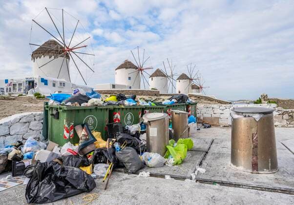 Overcrowded trash cans, problem of mass tourism, windmills, Mykonos, Cyclades, Aegean Sea, Greece, Europe Copyright: imageBROKER MoritzxWolf ibxmmw06726317.jpg