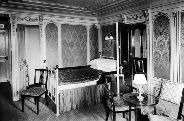 RMS Titanic was a British passenger liner that sank in the North Atlantic Ocean in the early morning of 15 April 1912, after colliding with an iceberg during her maiden voyage from Southampton to New York City.<br ><br > Of the 2,224 passengers and crew aboard, more than 1,500 died in the sinking, making it one of the deadliest commercial peacetime maritime disasters in modern history. The largest ship afloat at the time it entered service, the RMS Titanic was the second of three Olympic class ocean liners operated by the White Star Line, and was built by the Harland and Wolff shipyard in Belfast. UK: RMS Titanic, A Luxury Bedroom, c. 1912 xSupplier:xCPAxMediaxCo.xLtd.x Copyright: xx