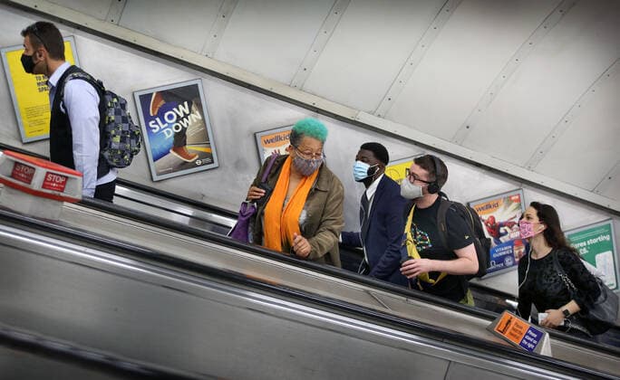 September 10, 2020, London, United Kingdom: Passengers wearing face coverings use the escalator at Kings Cross, during the covid 19 restrictions period..After more than a year of restrictions for travellers™ mandatory face mask wearing and social distancing will end (on Monday 19th July). The government has still advised the wearing of face masks and allowing extra space in crowded spaces indoors. London United Kingdom - ZUMAs197 20200910_zaa_s197_092 Copyright: xMartinxPopex