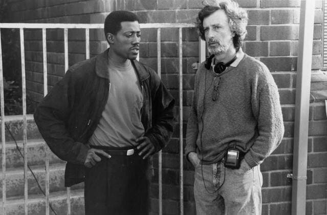 RISING SUN, from left: Wesley Snipes, Philip Kaufman, director, 1993. ? 20th Century Fox courtesy Everett Collection Ref:MBDRISU FE006 PUBLICATIONXNOTxINxCANxCHNxFRAxITAxJPNxNORxPOLxRUSxESPxUKxUSA Copyright: xx MBDRISU FE006