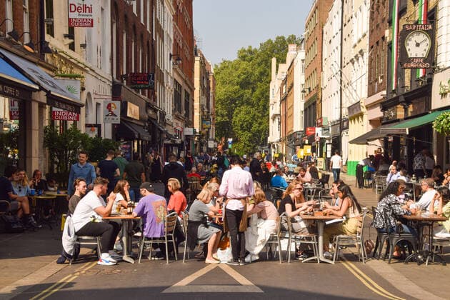 September 5, 2021, London, United Kingdom: Busy restaurants and cafes are seen in Frith Street as temporary al fresco, street seating continues in Soho..Several streets in Central London have been blocked for traffic at certain times of the day and at weekends to allow street seating at bars, cafes and restaurants during the coronavirus pandemic. London United Kingdom - ZUMAs197 20210905_zaa_s197_046 Copyright: xVukxValcicx