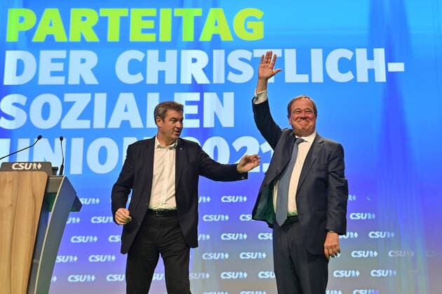 from left Markus SOEDER State Premier of Bavaria and CSU Chairman welcomes Armin LASCHET CDU Chairman and Candidate for Chancellor, who is celebrated on stage, CSU Party Congress 2021 on 10 and 11 09 2021 Fair Nuremberg