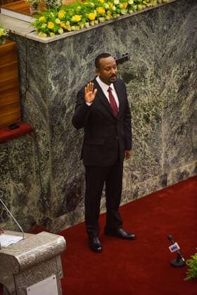 (211004) -- ADDIS ABABA, Oct. 4, 2021 -- Abiy Ahmed takes the oath as he is sworn in as Ethiopian prime minister in Addis Ababa, Ethiopia, on Oct. 4, 2021. Ethiopian parliament on Monday confirmed incumbent Abiy Ahmed as prime minister for a new five-year term. Abiy s Prosperity Party won a landslide victory in national elections held in June. He was sworn in as the country s prime minister Monday. ) ETHIOPIA-ADDIS ABABA-ABIY AHMED-PM-INAUGURATION MichaelxTewelde