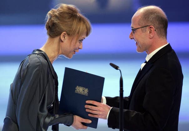 Heike Makatsch, German actress, left, and Ulrich Muehe, German actor, right, during the Bavarian Film Awards ceremony in Munich, Bavaria, January 13, 2006