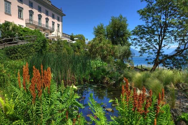 Villa and garden pond, botanical garden, Isole di Brissago, Lake Maggiore, Ticino, Lake Maggiore, Ticino, Brissago Islands, Switzerland, Europe Copyright: imageBROKER J.xKruse iblkjo05243933.jpg
