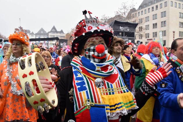 Carnivalists in costume in front of the stage on 11 11 2021 in Cologne at the opening of the Carnival Session 2021 2022 of the Cologne Carnival on the Heumarkt Traditionally on 11 11 at 11 oclock 11 the Cologne Carnival is opened with a big open air party