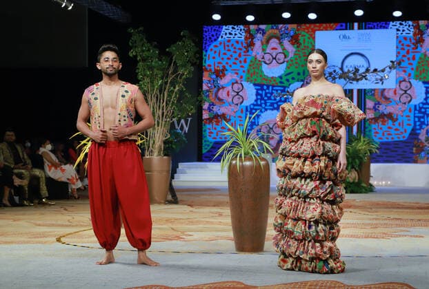 (211113) -- COLOMBO, Nov. 13, 2021 -- Models present creations during the Colombo Fashion Week (CFW) Swim Week in Colombo, Sri Lanka, on Nov. 12, 2021. The CFW Swim Week Colombo, scheduled for Nov. 12 and 13 in the national capital Colombo, will showcase works created by 11 local designers. (Photo by Xinhua) SRI LANKA-COLOMBO-FASHION WEEK AjithxPerera