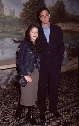 Kat Dennings and Bob Saget attend the WB Upfront 2001 at the Sheraton New York Hotel & Towers in New York City on May 15, 2001. Photo Copyright: xx