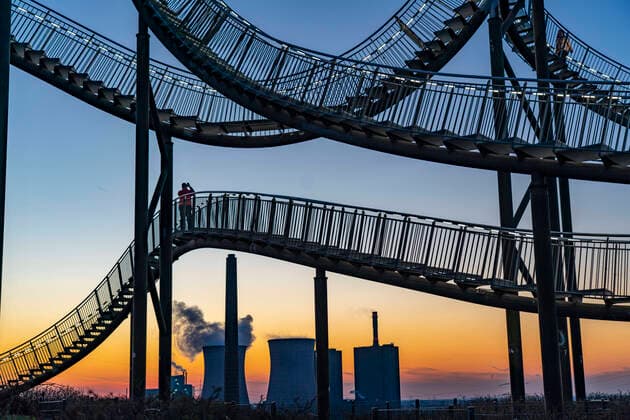 Landmark Angerpark Tiger Turtle Magic Mountain, walkable sculpture in the form of a roller coaster on the Heinrich Hildebrand Höhe slagheap, HKM steelworks, sunset, Duisburg, NRW, Germany, Tiger and Turtle