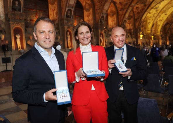 Award of the Bavarian Order of Merit by the Bavarian Prime Minister Dr Markus Söder from left Hansi Flick, Katrin Müller Hohenstein and Christian Neureuther with Bavarian Order of Merit, Munich Bavaria Germany Antiquarium of the Residence