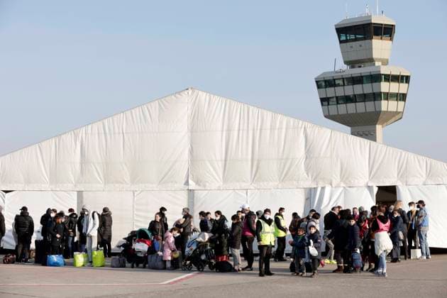 The Ukraine Arrival Center TXL for war refugees from Ukraine is opened on the Tegel airport site The refugees are provided with medical care, food, registered and distributed to other German states according to the Koenigsteiner Schluessel DEU, Berlin, 20 03 2022