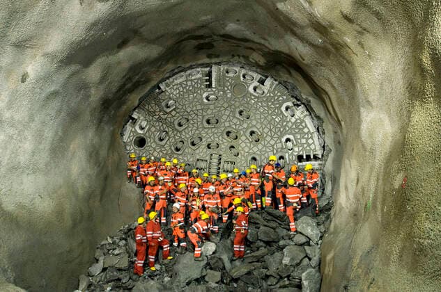 NEAT INTERMEDIATE INTERPRETATION Miners and the tunnel patroness with a statue of St. Barbara in the Gotthard Base Tunnel of the New Rail Link through the Alps NEAT on Wednesday 16 09 09 between Erstfeld and Amst  Copyright: Ex-PressxMarkusxFortex MFO20090916_036