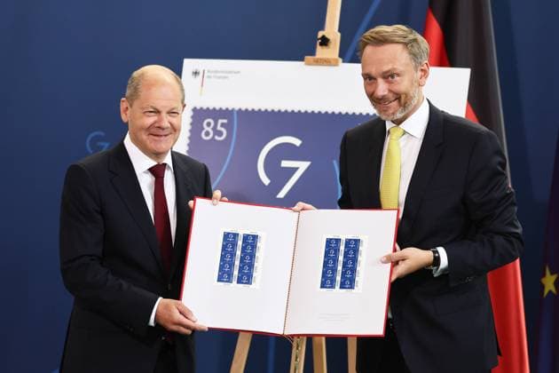 Federal Chancellor Olaf Scholz and Federal Minister of Finance Christian Lindner during the presentation of the special postage stamp G7 Presidency in Chancellery in Berlin on 15 June 2022 presentation of the special postage stamp G7 Presidency