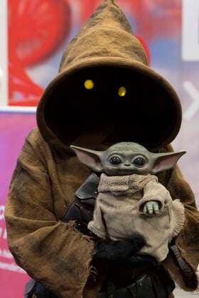 costumed visitors, Costume Players, Baby Yoda, Star Wars, Gamescom fair in Cologne on 24 08 2022,