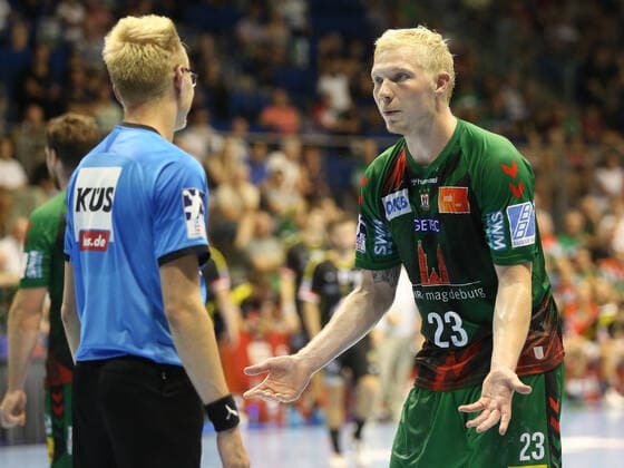Magnus sucking force SC Magdeburg and DHB Referees Niels Wienrich at Hummel Cup against Chambery Savoie HB on 18 08 2022 1089908423