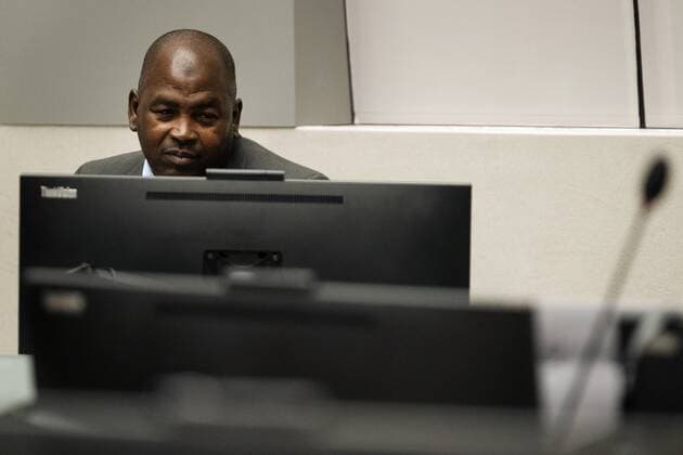 2022 09 26 09 32 48 Mahamat Said Abdel Kani takes his seat in the court room of the International Criminal Court in The Hague, Netherlands, Monday, Sept 26, 2022 The trial of an alleged commander in a mainly Muslim rebel group from Central African Republic opened and charged Said with crimes against humanity and war crimes AP Photo Peter Dejong, Pool nethe  Copyright: xx x455369398x originalFilename: 455369398.jpg
