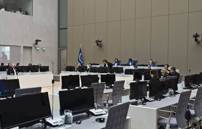 2022-09-26 09:33:28 General view of the court room with presiding judge Miatta Maria Samba, centre, right, and public prosecutor Karim Khan, left, during the trial of Mahamat Said Abdel Kani at the International Criminal Court in The Hague, Netherlands, Monday, Sept. 26, 2022. The trial of an alleged commander in a mainly Muslim rebel group from Central African Republic opened and charged Said with crimes against humanity and war crimes. (AP Photo Peter Dejong, Pool) netherlands out - belgium out Copyright: xx x455371452x originalFilename: 455371452.jpg