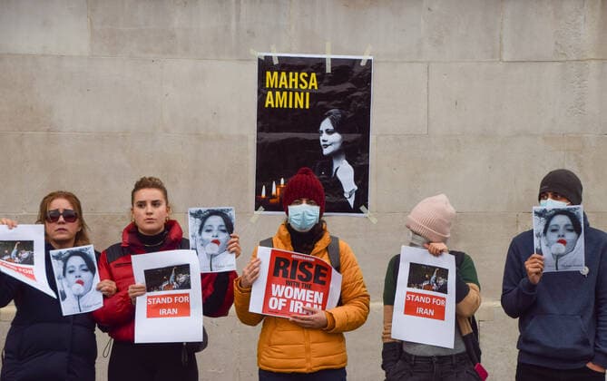 September 27, 2022, London, United Kingdom: Protesters hold pictures of Mahsa Amini and placards in solidarity with protests in Iran during the demonstration in Trafalgar Square. Protesters continue to gather in London in response to the death of Mahsa Amini, who died in police custody in Iran after being detained for allegedly not wearing a head scarf (hijab) properly in public. London United Kingdom - ZUMAs197 20220927_zaa_s197_110 Copyright: xVukxValcicx