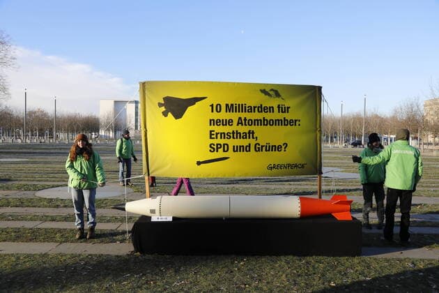 Germany, Berlin, Greenpeace demonstration in front of the Chancellors Office