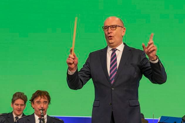 The Brandenburg Minister President Dietmar Woidke conducts the Brandenburg Police Orchestra with the Brandenburg anthem Märkische Heide, märkischer Sand at the Brandenburg Day in the Brandenburg Hall at the 87 International Green Week at the exhibition grounds in Berlin Charlottenburg The International Green Week is the worlds largest trade fair