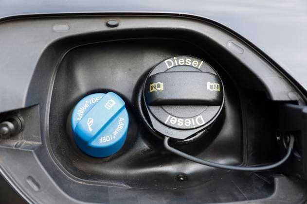 AdBlue filler neck and diesel filler neck on passenger car Due to the AdBlue shortage, the costs for AdBlue have multiplied Gas is required for production Symbol photo, subject photo Cologne, 24 01 2023 Foto:xR.xSchmiegeltx xFuturexImage