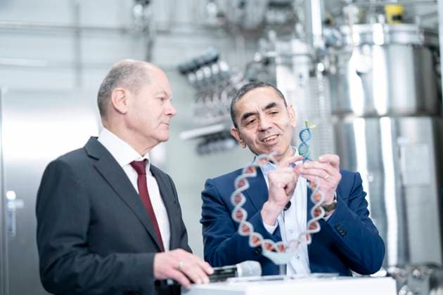 German Chancellor visits BioNTech on the occasion of the construction completion of the plasmid production in Marburg German Chancellor Olaf Scholz with Ugur Sahin, founder and CEO Biontech SE during his vi