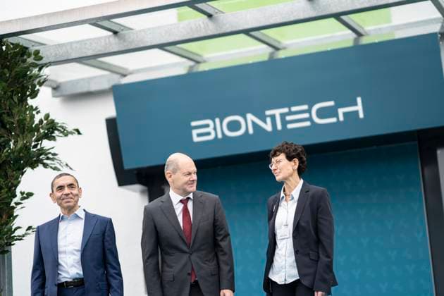 German Chancellor visits BioNTech on the occasion of the constructional completion of the plasmid production in Marburg Ugur Sahin, founder and CEO Biontech SE left and