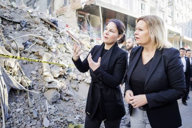Annalena Baerbock Buendnis 90 Die Gruenen , Federal Minister of Foreign Affairs, and Nancy Faeser SPD , Federal Minister of the Interior and Home Affairs, photographed during a walk through a street destroyed by the earthquake in Pazarcik, 21 02 2023 Pazarcik Turkey. Copyright: xKiraxHofmannx