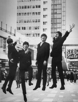 SCANPIX SWEDEN, 1963 The Beatles on a visit to Stockholm The picture shows the members of the group clipped in Sergels torg with the high-rise buildings in the background Jumping up with arms outstretched Sweden x20360x  Copyright: xTTx THE BEATLES STOCKHOLM