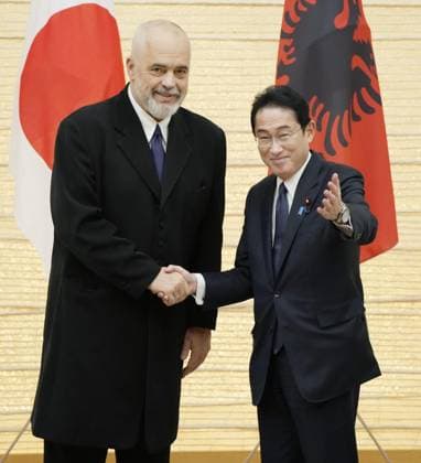 Japan-Albania talks Japanese Prime Minister Fumio Kishida (R) shakes hands with his Albanian counterpart Edi Rama following their joint press conference at the premier s office in Tokyo on Feb. 22, 2023.  A14AA0001398901P