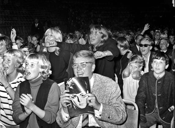 ARCHIVE 1964 07 28 Devoted Beatles fans in the audience when the British pop group The Beatles performs at Johanneshovs Isstadion in Stockholm July 28th 1964 Stockholm Sweden x1047x  Copyright: xFreddyxLindströmx xTTx x BEATLES-STOCKHOLM 1964