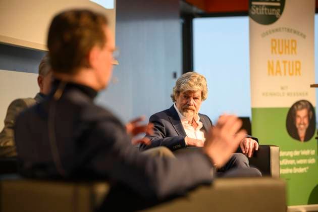 Reinhold MESSNER author and mountaineer godfather of the project RuhrNatur blurred in the foreground Hendrik WUEST Wüst NRW Ministerpraesident, CDU panel discussion on the project RuhrNatur of the Brost Foundation, on 23 02 2023 in Essen Germany
