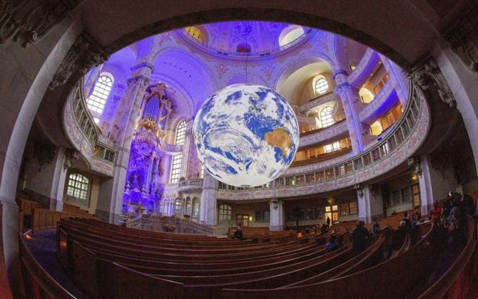 In the main room of the Dresden Frauenkirche floats a seven-meter globe Photo from 03 03 2023 The 3D art installation Gaia ancient Greek Earth by British artist Luke Jerram is located at a height of three meters and rotates once every four m Copyright: epd-bild MatthiasxSchumann epd-Kunstinstallation_Gaia2-kopieren