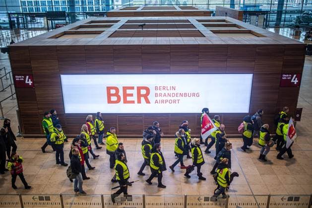 A warning strike by verdi paralyzes Berlin Brandenburg Airport on March 13, 2023 Airport employees strike in the terminal Warning strike at BER