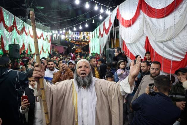 Bilder des Jahres 2023, News 03 März News Themen der Woche KW12 Palestinians take part in a festive event to celebrate Ramadan, the holiest Muslim month, two days before it starts, in Khan Yunis town in the southern Gaza Strip on Wednesday March 22, 2023. Muslims throughout the world are celebrating Ramadan, the holiest month in Islamic calendar, refraining from eating, drinking, smoking and sexual relations from dawn to dusk, It is believed that during this month the Prophet Mohammed received the revelations of the Quran. GAZ2023032206 IsmaelxMohamad