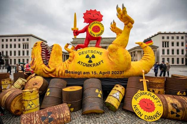 Greenpeace presents AKW dinosaur at the Brandenburg Gate, On the occasion of the shutdown of the last three remaining nuclear power plants AKW in Germany, Greenpeace presents a four-meter-high sculpture of a shot dinosaur at the Brandenburg Gate The