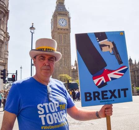 May 24, 2023, London, England, United Kingdom: Activist STEVE BRAY holds an anti-Brexit sign as anti-Tory and anti-Brexit protesters stage their weekly protest in Parliament Square. London United Kingdom - ZUMAv130 20230524_zip_v130_008 Copyright: xVukxValcicx