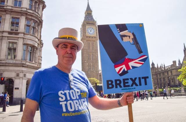 May 24, 2023, London, England, United Kingdom: Activist STEVE BRAY holds an anti-Brexit sign as anti-Tory and anti-Brexit protesters stage their weekly protest in Parliament Square. London United Kingdom - ZUMAv130 20230524_zip_v130_010 Copyright: xVukxValcicx