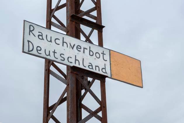 Sign in the shape of a cigarette with the inscription Smoking ban Germany Sachsen Deutschland, Germany GMS8980