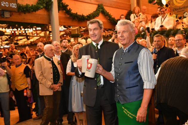 Markus Söder Prime Minister of Bavaria and Dieter Reiter Mayor of Munich Wiesn opening 2023 tapping Schottenhammel Theresienwiese Munich 16 September 2023
